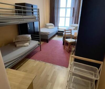Two single beds and 1 bunk bed